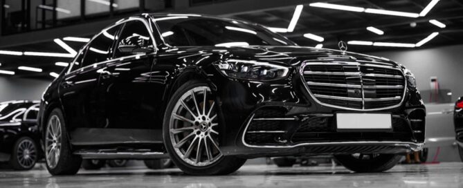 Black Mercedes S 560 luxury sedan parked in Chicago, providing premium executive black car service